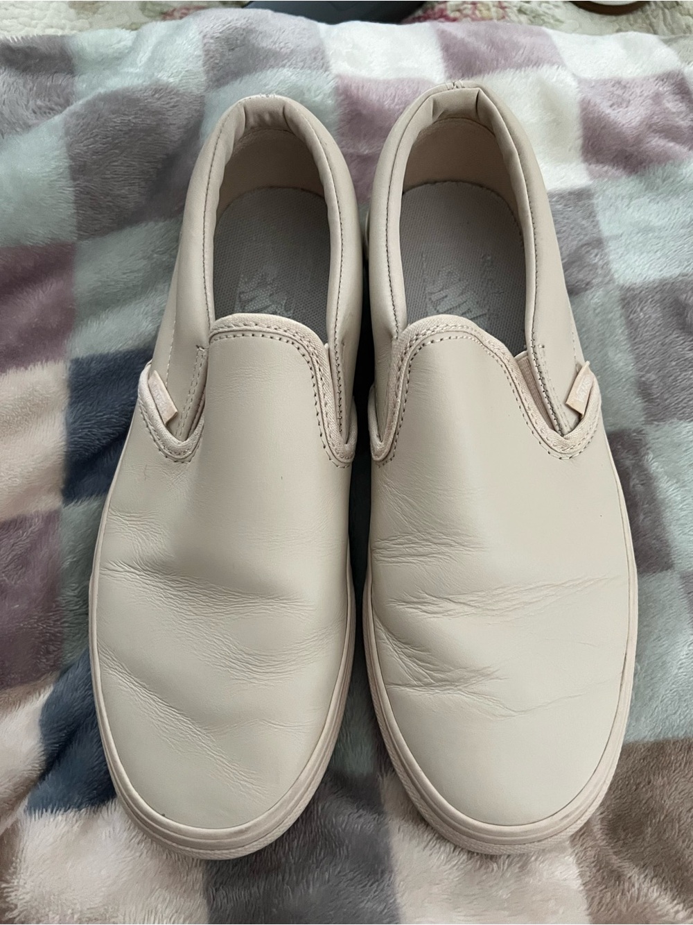 Vans women’s Casual Sneakers in a blush light pink cream type color.